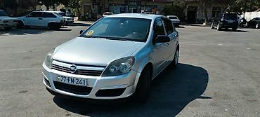 Opel: Opel Astra H, 5 qapılı hetçbek - Gümüşü rəng - Benzin mühərriki - Ön — 14