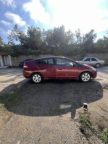 sador disk: Honda Insight – hibrid hetçbek - Rəng: tünd qırmızı/metalik - Kuzov — 1