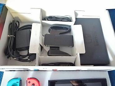 Nintendo Switch: 🔥 JEDINSTVENA PONUDA! Prodajem Nintendo Switch 32GB + microSD 400GB — 2