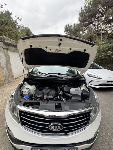 Kia: Kia Sportage: 0.2 l | 2015 il Universal — 21