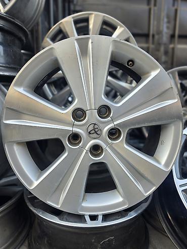 Литой диск Toyota, оригинальный - Материал: алюминиевый сплав (литой)