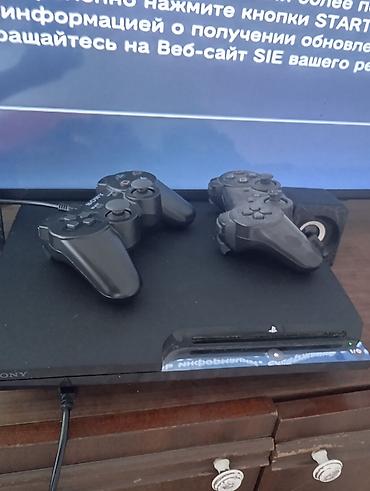 sony playstation 3: Игровая консоль Sony PlayStation 3 (Super Slim) с двумя беспроводными — 1
