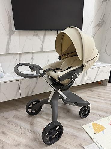 коляски анекс бу: Stokke brendi. 2300 azn alinib yeni kimi qalib. Tutacaqi yuxarida — 2