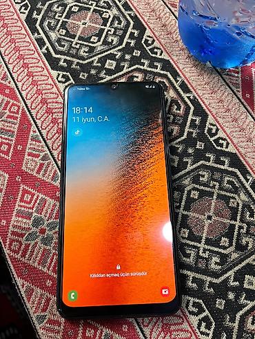 retro telefonlar: Samsung Galaxy A50, rəng - Qara, Barmaq izi — 1
