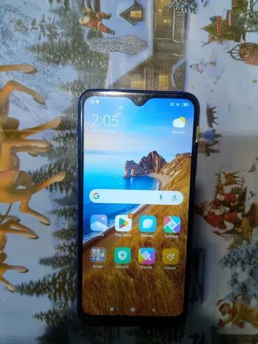 Xiaomi: Xiaomi Redmi 8A — 5