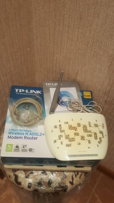 wifi modem adapter: TP_Link wifi modem . yaxşı işleyir 
5 manat