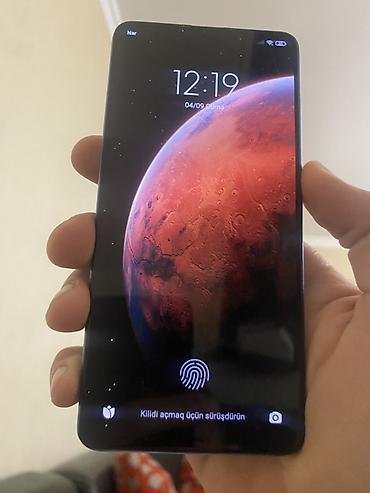 not 12 pro plus: Xiaomi Redmi (arxa hissədə “Redmi – Designed by Xiaomi” yazılı, mavi — 2