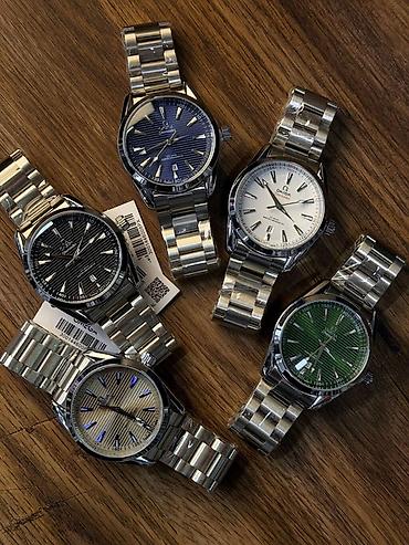 часы omega: Коллекция мужских наручных часов в классическом стиле на стальном — 1
