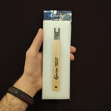 gitara dayağı: Pin çıxardan Akustik gitara üçün pin çıxardan Ünvan:Nizami 42 (Daxil — 2