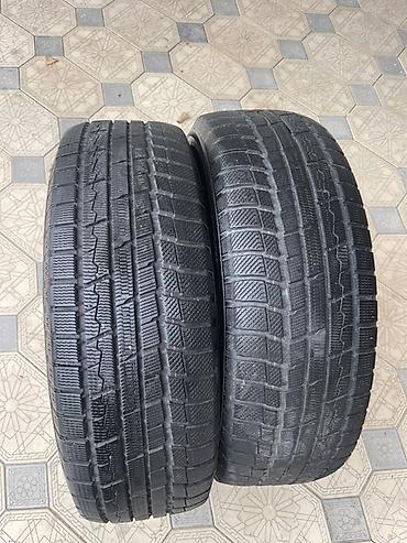 Шины: Продаю 2 зимние шины TOYO ❄️ Размер: 235/65 R18 • 106Q Бренд: TOYO — 1