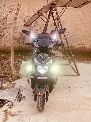 Скутеры: Скутер Skillmax, черный, с богатым комплектом освещения и туристским — 24