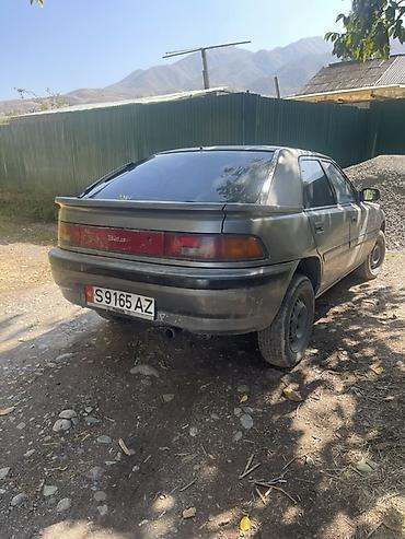 Mazda: Mazda 323: 1990 г., 1.6 л, Механика, Хэтчбэк — 1