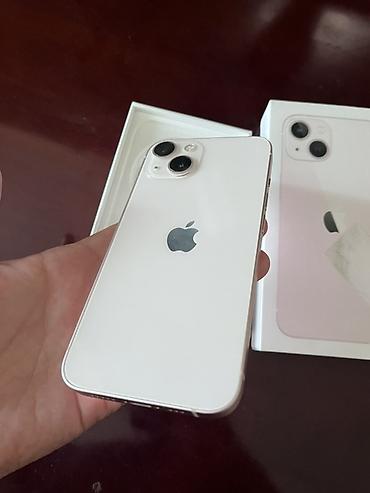 Мобильные телефоны и аксессуары: IPhone 13, 128 ГБ, цвет Starlight (белый). В комплекте: фирменная — 3