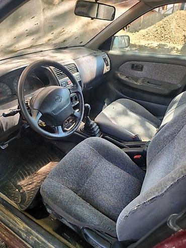 нур мото: Nissan Almera: 1998 г., 1.4 л, Механика, Седан — 3