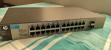 Modemlər və şəbəkə avadanlıqları: HP 1810-24G Switch (J9803A) - 24 ədəd 10/100/1000 Mbps RJ-45 portu — 1