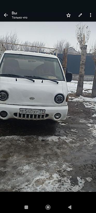 ender s: Грузовой мини‑грузовик Hyundai Porter (кабовер), белый цвет, бортовая — 3