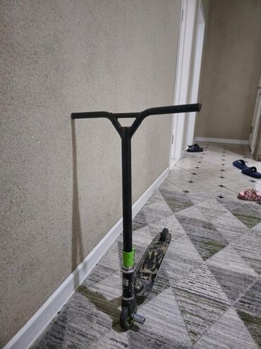 самакат трюковый: Самокат, Трюк, Колдонулган