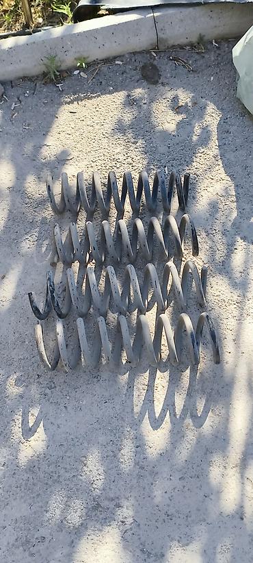 nolyedi sekilleri: Məhsul: Avtomobil üçün spiral yay dəsti Təsvir: - Şəkillərdə 4 ədəd — 1