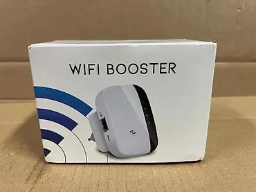 Modemi, ruteri i mrežni uređaji: Wireless‑N WiFi Repeater Opis: - Pojačivač/bežični repetitor koji — 11