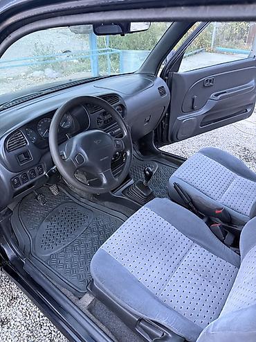 муравей с бензином: Daihatsu Cuore: 2001 г., 1 л, Механика, Бензин, Купе — 10
