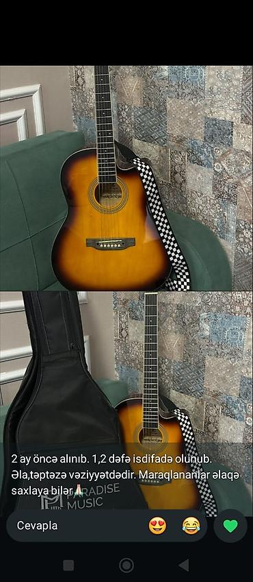 gitara qara: Akkustik gitara – kəsimlə (cutaway) korpus, sunburst (sarı-qəhvəyi) — 1