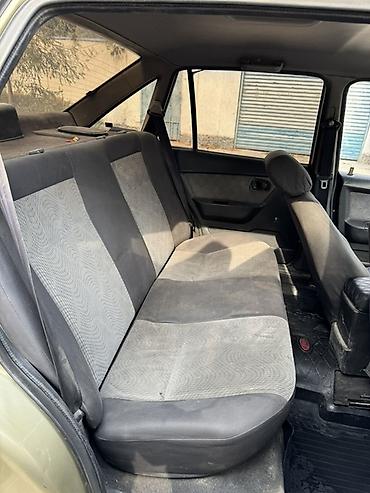 tiger auto: Daewoo Nexia: 2011 г., Механика, Бензин, Седан — 5