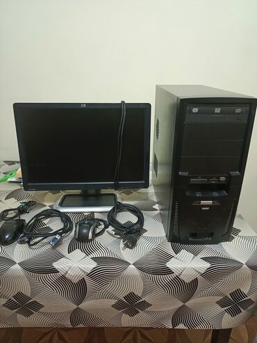 Модемы и сетевое оборудование: HP monitor və qara rəngli sistem bloku, həmçinin siçan və lazımi