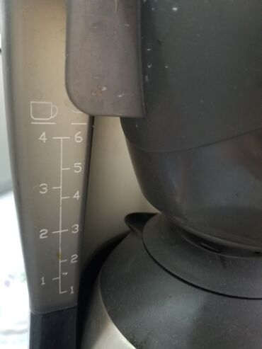 Кофеварка чёрного цвета б/у 1000сом .разные