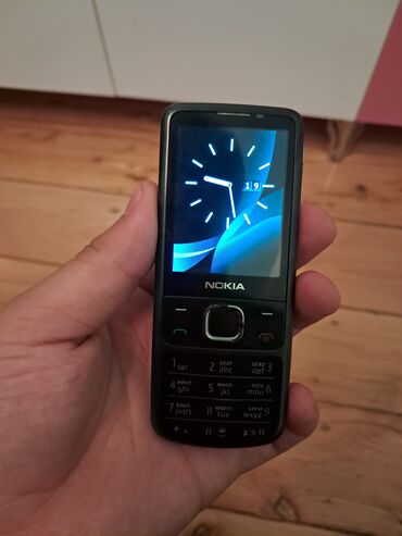 ikinci el soyuducular gence: Nokia 6700 Slide, rəng - Qara, Düyməli, İki sim kartlı