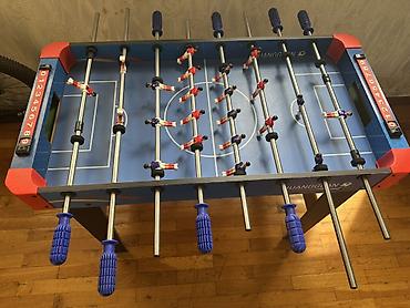İdman və hobbi: Stolüstü futbol (foosball) masası ideaı qalib 8 cubuqludur — 3