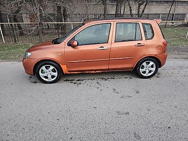Mazda: Mazda 2: 2003 г., Механика — 9