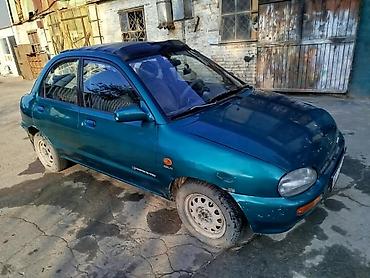 мазла: Mazda 121: 1995 г., Механика, Бензин, Седан — 1