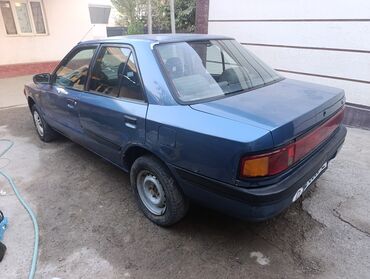 Mazda: Mazda 323: 1990 г., 1.6 л, Механика, Бензин, Седан