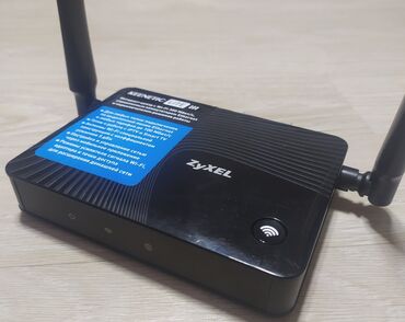 антенну для модема: Wi Fi роутер б/у, почти в отличном состоянии, фирмы ZyXEL. Wi Fi 300
