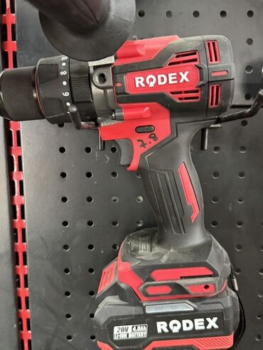 дрель продажа: Аккумуляторная дрель-шуруповерт Rodex черного и красного цвета. Имеет