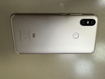 xiaomi mi 910: Xiaomi Mi A2, 64 ГБ, цвет - Золотой, 
 Сенсорный, Отпечаток пальца, Две SIM карты