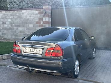 сколько стоит коврик: Mitsubishi Carisma: 2003 г., Механика, Дизель, Седан — 2