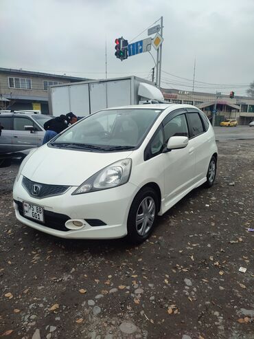 100 перохдка: Honda Fit: 2010 г., 1.5 л, Автомат, Бензин, Хэтчбэк