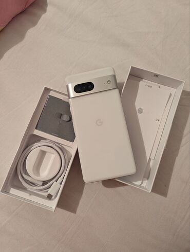 телефон 7: Google Pixel 7, Б/у, 128 ГБ, цвет - Белый, 1 SIM, eSIM
