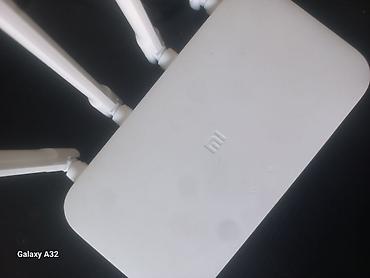 Xiaomi Mi Wi‑Fi Router (4 antennali) + TP‑Link ADSL/VDSL modem-router