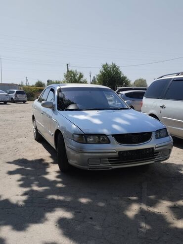 авто на рассрочка: Mazda Capella: 1999 г., 2 л, Автомат, Бензин, Седан