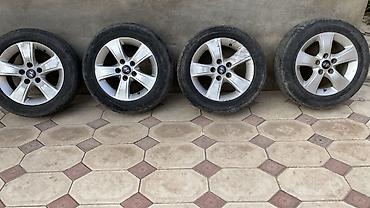 corolla runx: Комплект из 4 оригинальных литых дисков Hyundai с шинами — 1