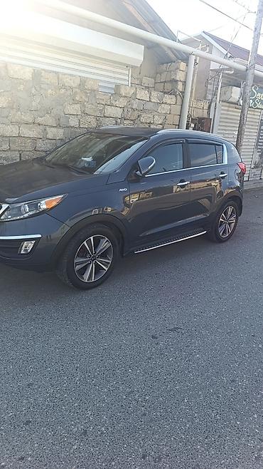 kia cerato manitoru: Kia Sportage (III nəsil) krossover - Kuzov: tünd-boz rəng, 5 qapı - — 1