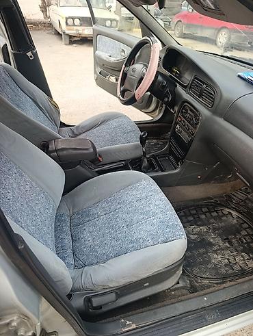 Kia: Kia Clarus: 1999 г., Механика, Седан — 7