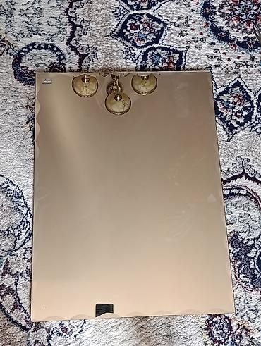 berber mirror second hand: Зеркало настенное бронзового оттенка. - Прямоугольная форма. - Фацет — 1