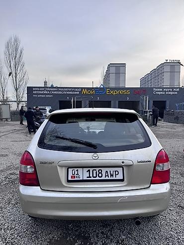 shevrolet lacetti: Mazda 323: 2002 г., 1.6 л, Автомат, Бензин, Универсал — 4