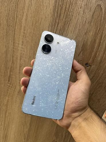 Мобильные телефоны и аксессуары: Redmi 13C, 128 ГБ, цвет - Голубой, Отпечаток пальца, Face ID — 3