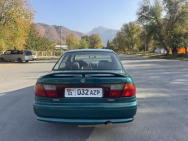 плуг для мтз трактора: Mazda 323: 1997 г., Механика, Бензин, Седан — 6