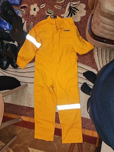kişi cinsləri: Mavi rəngli kişi kostyumu – paketlənmiş halda. mavi kamizonlar 15 — 8