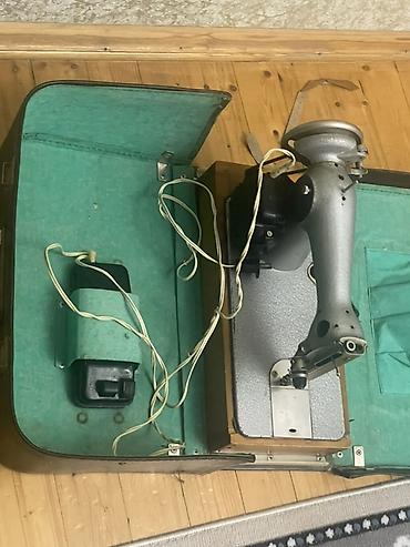 qədim tikiş maşınları: Elektrik tikiş maşını – daşıma çamadanı ilə - Köhnə tip elektrik — 1